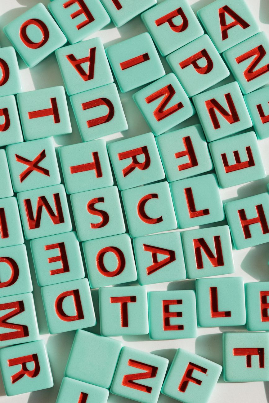 colorful scrabble tiles arrangement in light